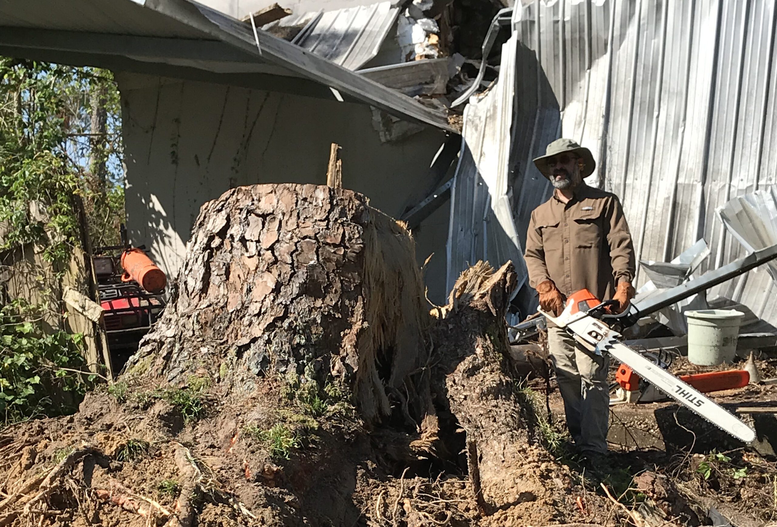 Man Holding a Chainsaw